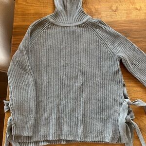 Gorgeous UGG sweater ribbing is beautiful never been worn. Great w/ high boots.